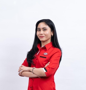 Siti Nur Fhariesa, Executive Director, arms folded, in a red SBI shirt.