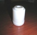 A shorter white outer cover with ribs around its base.